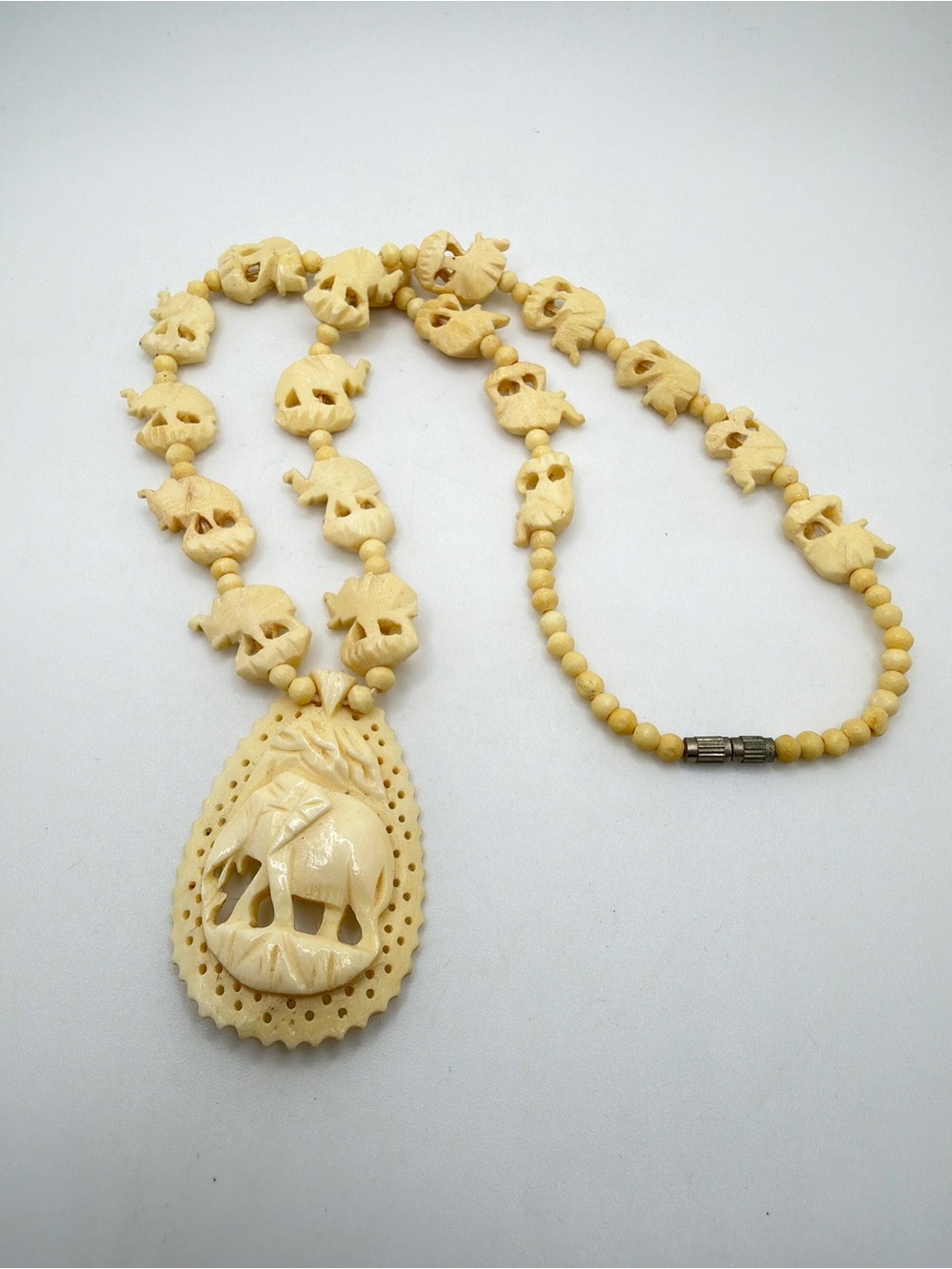 19" Vintage Carved Bone Elephant‎ necklace with silver tone barrel clasp!